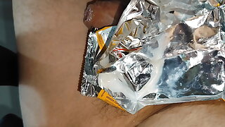 Boy's fetish on accumulating the geyser in plastic packaging after the intense orgasm.