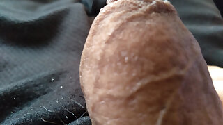 youthful man handles his big penis with superb skill